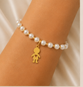 F63, pulseira em perolas 2 meninos/as